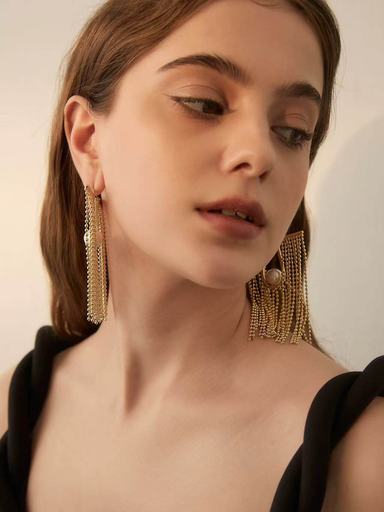 Perlenohrringe mit Quasten